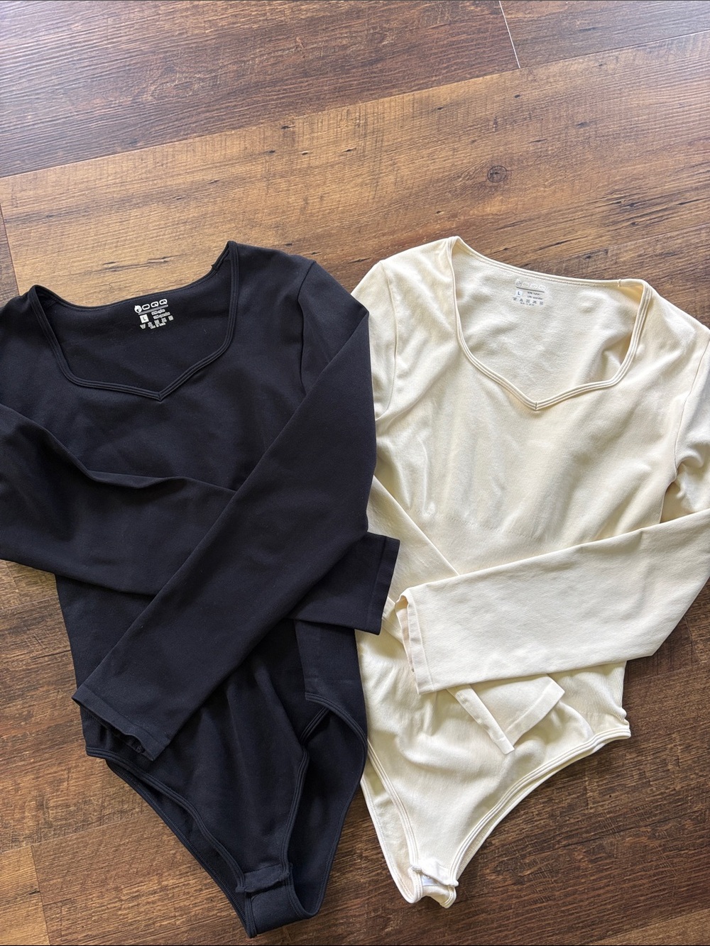 Closet Staple! Two Women’s Long Sleeve Bodysuits - Black and Cream